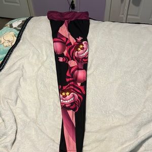 Alice in the wonderland leggings never worn